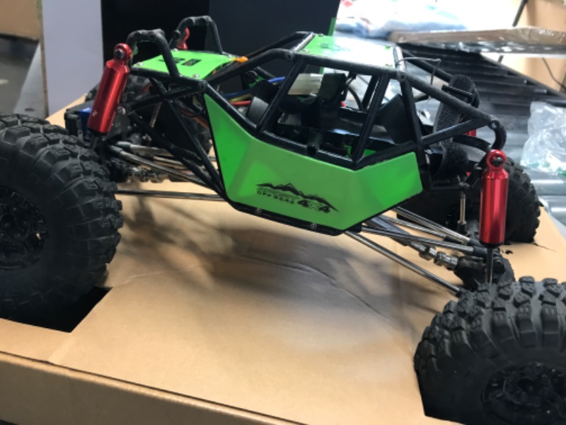 Photo 2 of **USED/DIRTY**
Integy RC Model C30754GREEN 1/10 Scale RC Rock Bouncer Chassis Kit w/ Tires & Wheels (No Electronics)
