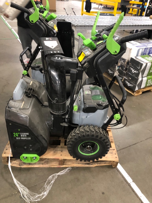 Photo 4 of **Chute rotation assembly has broken cable**
EGO SNT2400 24 in. Self-Propelled 2-Stage Snow Blower with Peak Power Battery and Charger Not Included, Black
