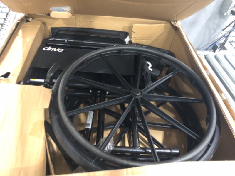 Photo 2 of (Major Damage) Drive Medical SSP118FA-SF Silver Sport 1 Folding Transport Wheelchair with Full Arms and Removable Swing-Away Footrest, Black