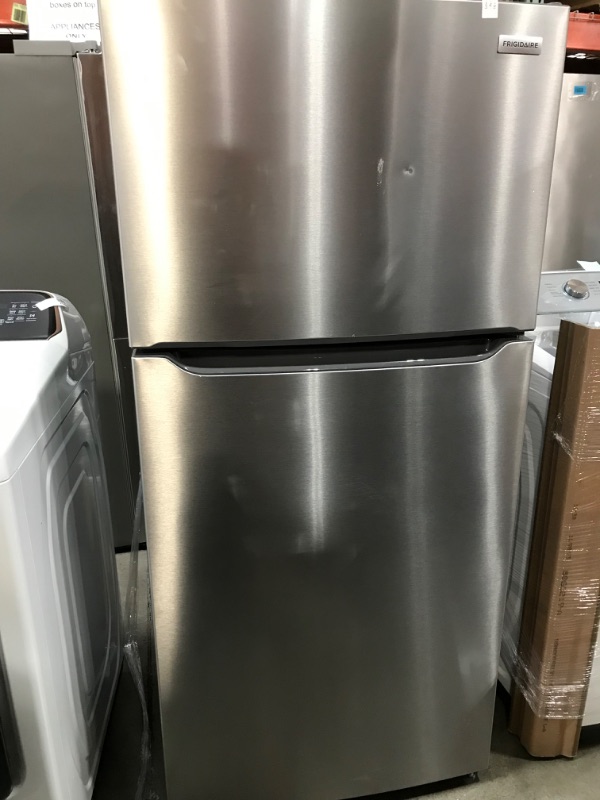 Photo 2 of Frigidaire Garage-Ready 20-cu ft Top-Freezer Refrigerator (Fingerprint Resistant Stainless Steel)
