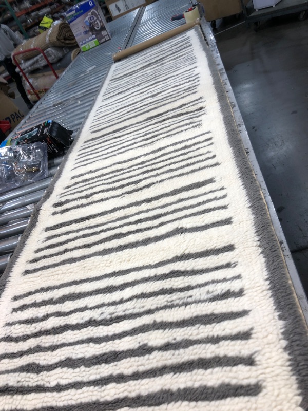 Photo 1 of 2' x 8' white with grey line pattern area rug 