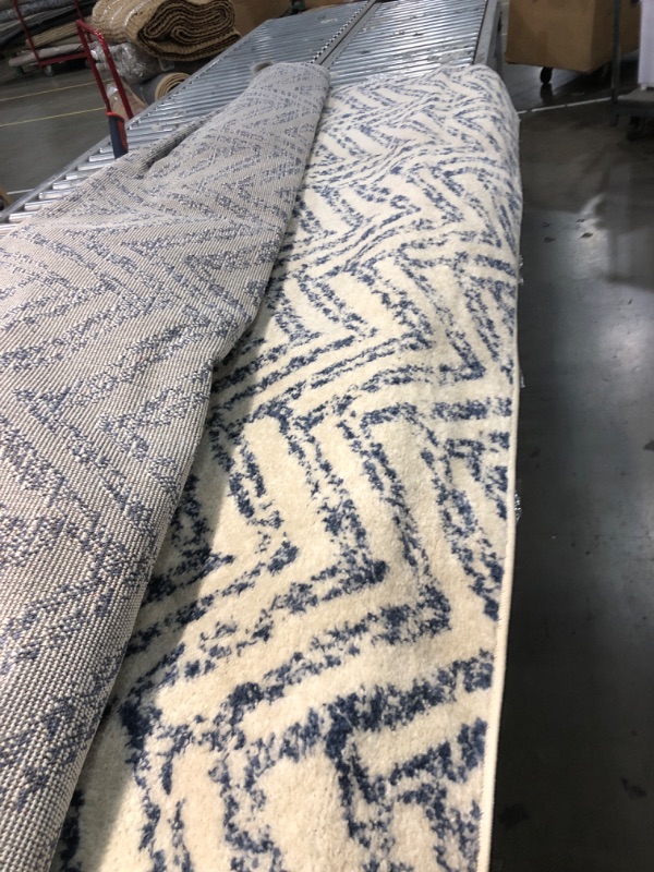 Photo 1 of 7'11'' x 9' blue and white pattern area rug 