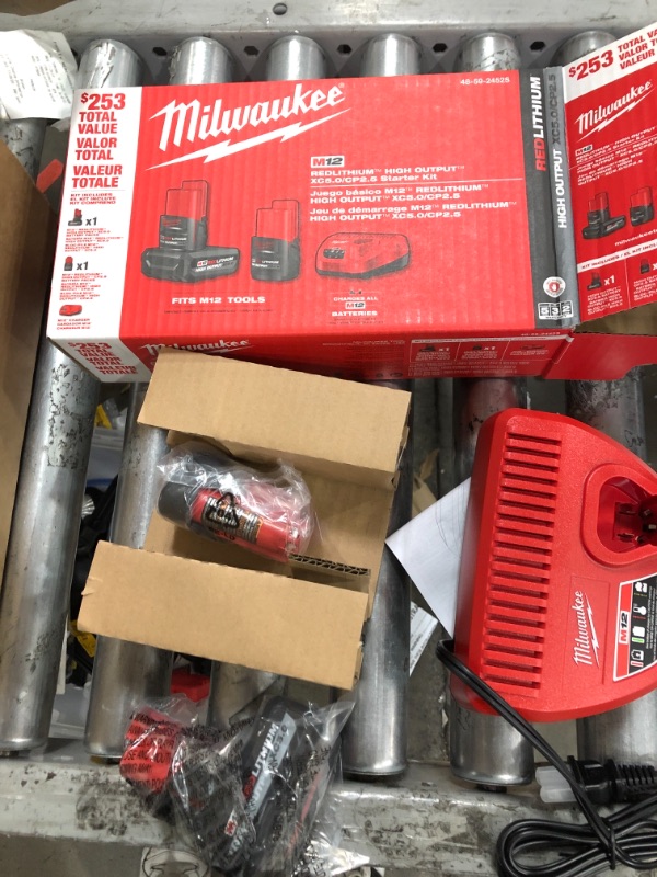 Photo 2 of ***READ NOTES***Milwaukee M12 12-Volt Lithium-Ion High Output 5.0 Ah and 2.5 Ah Battery Packs and Charger Starter Kit
