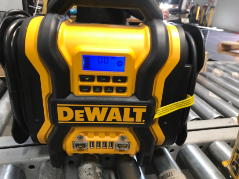 Photo 2 of DEWALT DXAEPS14 1600 Peak Battery Amp 12V Automotive Jump Starter/Power Station with 500 Watt AC Power Inverter, 120 PSI Digital Compressor, and USB Power , Yellow