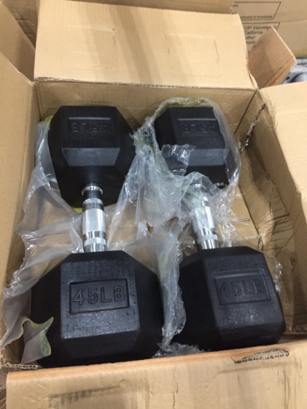 Photo 1 of 45 pound dumbells