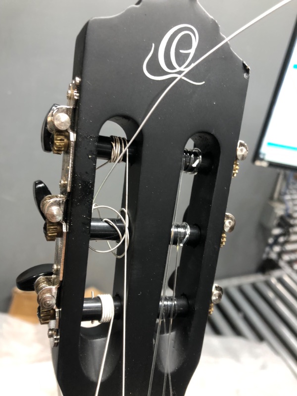 Photo 1 of ***NECK HAS MAJOR DAMAGE - TORN OFF - SEE PICTURES - STRINGS BROKEN***
Ortega Guitars 6 String Student Series Full Size Nylon Classical Guitar, Right (RST5MBK)