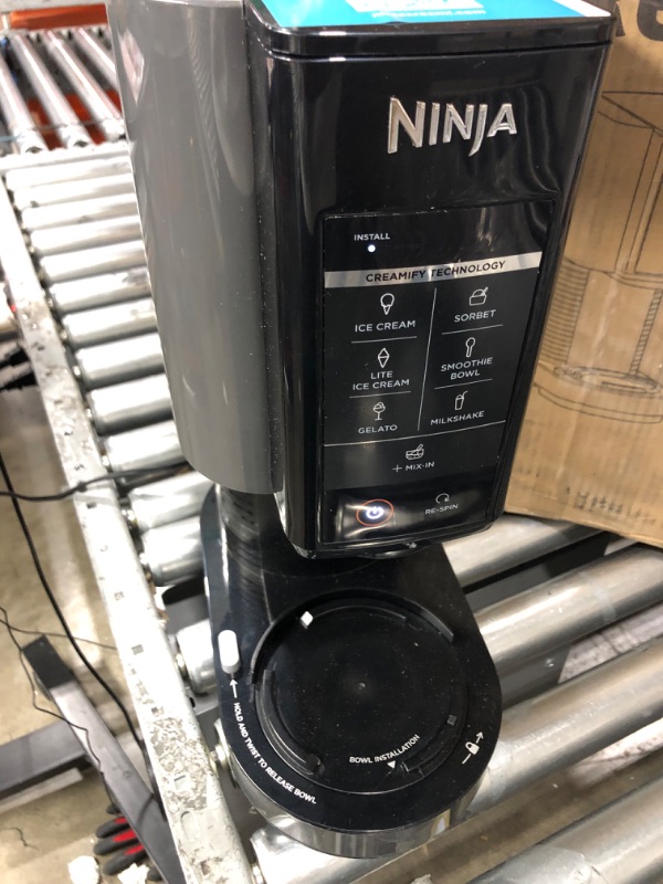 Photo 4 of **PARTS ONLY**NON REFUNDABLE NO RETURNS SOLD AS IS**
Ninja NC299AMZ CREAMi Ice Cream Maker, for Gelato, Mix-ins, Milkshakes, Sorbet, Smoothie Bowls & More, 7 One-Touch Programs, with (1) Pint Container & Lid, Compact Size, Perfect for Kids, Matte Black 1 