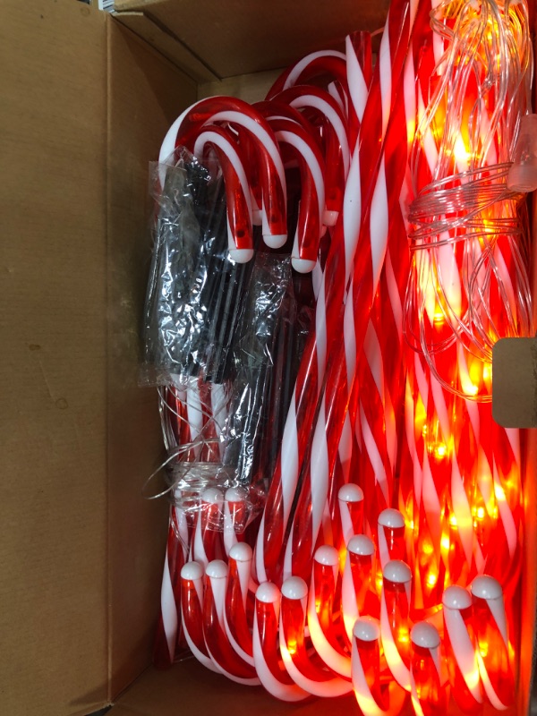 Photo 2 of 30 Pcs Christmas Candy Cane Lights, 23 Inches Candy Cane Pathway Markers Lights with 8 Lighting Modes LED Christmas Outdoor Candy Lights with Stake for Christmas Yard Decorations (Red)