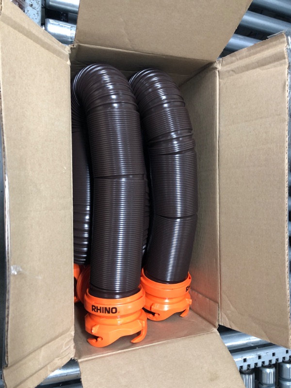 Photo 2 of Camco 20' (39742) RhinoFLEX 20-Foot RV Sewer Hose Kit, Swivel Transparent Elbow with 4-in-1 Dump Station Fitting-Storage Caps Included , Black , Brown 20ft Sewer Hose Kit Frustration-Free Packaging