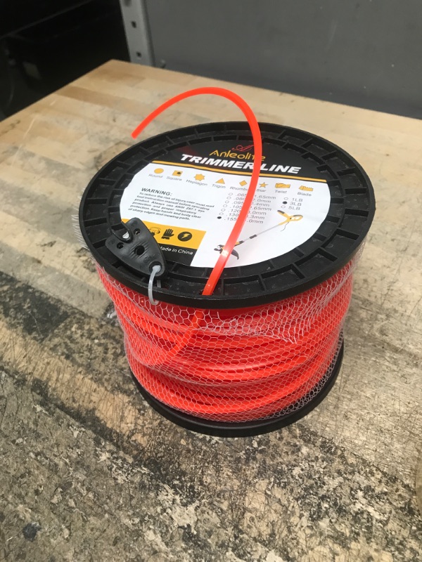 Photo 2 of A ANLEOLIFE 3-Pound Commercial Square .155-Inch-by-1280-ft String Trimmer Line in Spool, with Bonus Line Cutter, Orange 3lb .155" Commercial