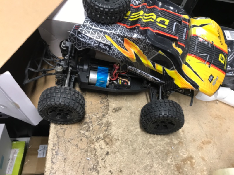 Photo 2 of DEERC 9201E 1:10 Large Remote Control Truck with Lights, Fast Short Course RC Car, 48 km/h 4x4 Off-Road Hobby Grade Toy Monster Crawler Electric Vehicle with 2 Rechargeable Batteries for Adult Kid Boy