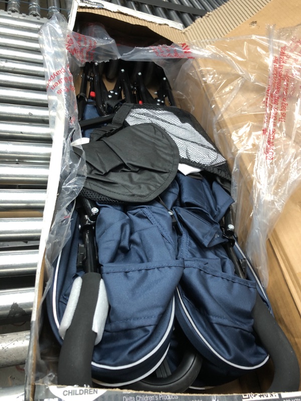 Photo 1 of Delta Children LX Side by Side Stroller - with Recline, Storage & Compact Fold, Night Sky
