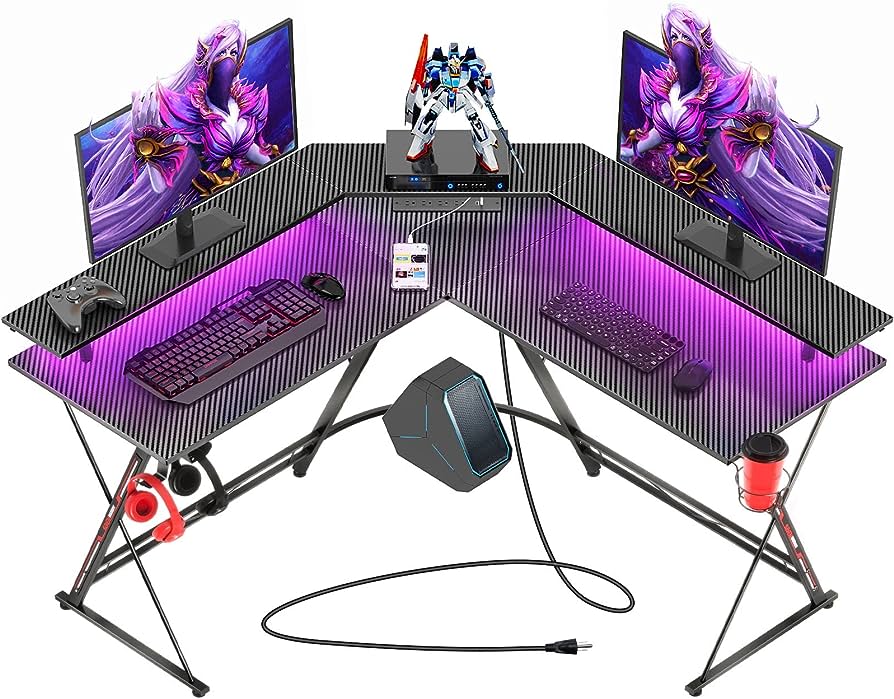 Photo 1 of SEVEN WARRIOR L Shaped Gaming Desk with LED Lights & Power Outlets, 50.4” Computer Desk with Monitor Stand & Carbon Fiber Surface, Corner Desk with Cup Holder, Gaming Table with Hooks, Black