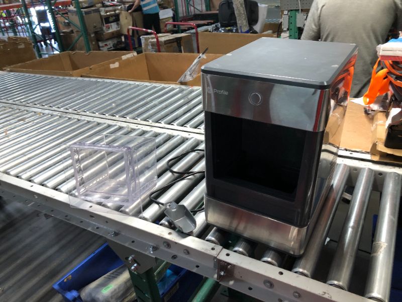 Photo 1 of ***USED AND DIRTY - DAMAGED - CRACKED - POWERS ON - UNABLE TO TEST FURTHER***
GE Profile Opal 2.0 | Countertop Nugget Ice Maker | Ice Machine with WiFi Connectivity | Smart Home Kitchen Essentials | Stainless Steel Stainless Steel Ice Maker