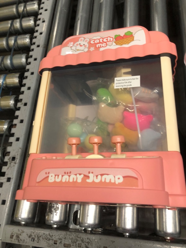 Photo 1 of Florarich Mini Claw Machine for Kids with Prizes, Candy Vending Machine Toy, Electronic Arcade Game Prize Dispenser with 60-Second Countdown, and 25 Mini Toys, Great Birthday Gifts for 3-9 Year Olds
