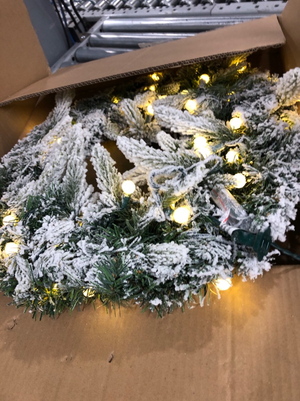 Photo 2 of 24" Snowy Flocked Christmas Wreath with 50 Count Warm White Raspberry Lights, Lighted Artificial Holiday Wreath with UL Listed Plug-in G12 LED String Lights (Warm White G12)