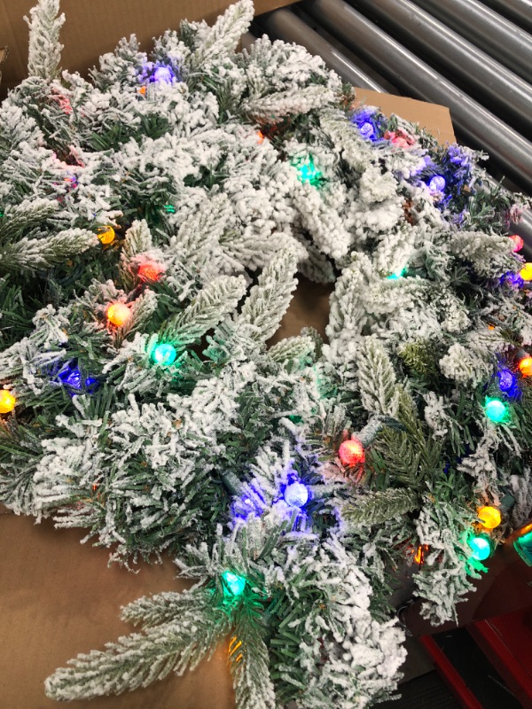 Photo 1 of 24" Snowy Flocked Christmas Wreath with 50 Count Multicolor Raspberry Lights, Lighted Artificial Holiday Wreath with UL Listed Plug-in G12 LED String Lights (Multicolor G12)1021075410

