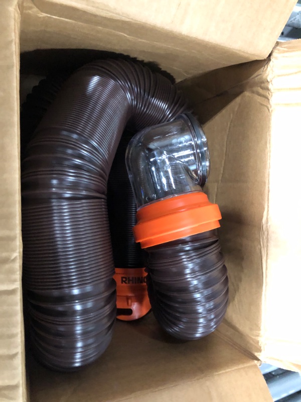 Photo 1 of Camco RhinoFLEX RV Sewer Hose Kit with Swivel Transparent Elbow and 4-in-1 Dump Station Fitting, Brown, 15 Feet (39770) 15ft Sewer Hose Kit Frustration-Free Packaging
