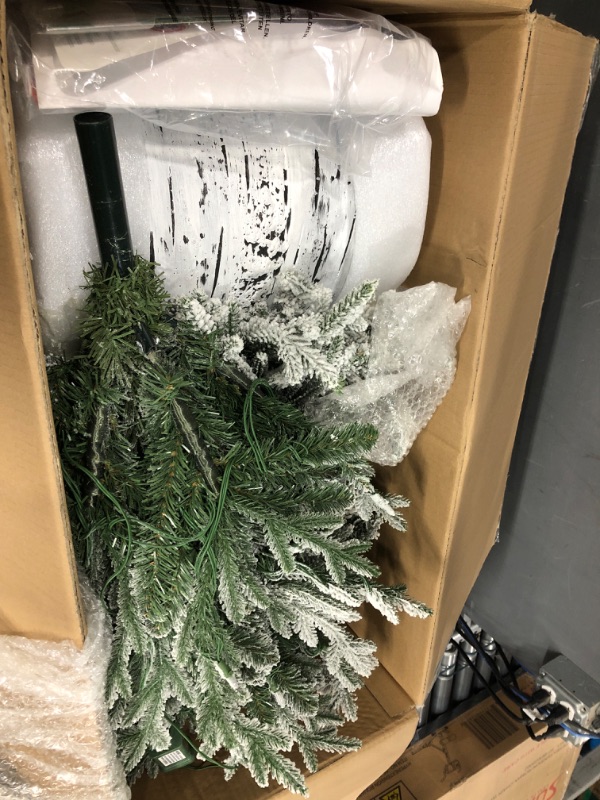 Photo 2 of ***USED - MISSING PARTS - SEE COMMENTS***
Puleo International Pre-Lit Potted Flocked Arctic Fir Pencil Artifical Artificial Christmas Tree, Green, 301-PTO9760-60LW120 6'