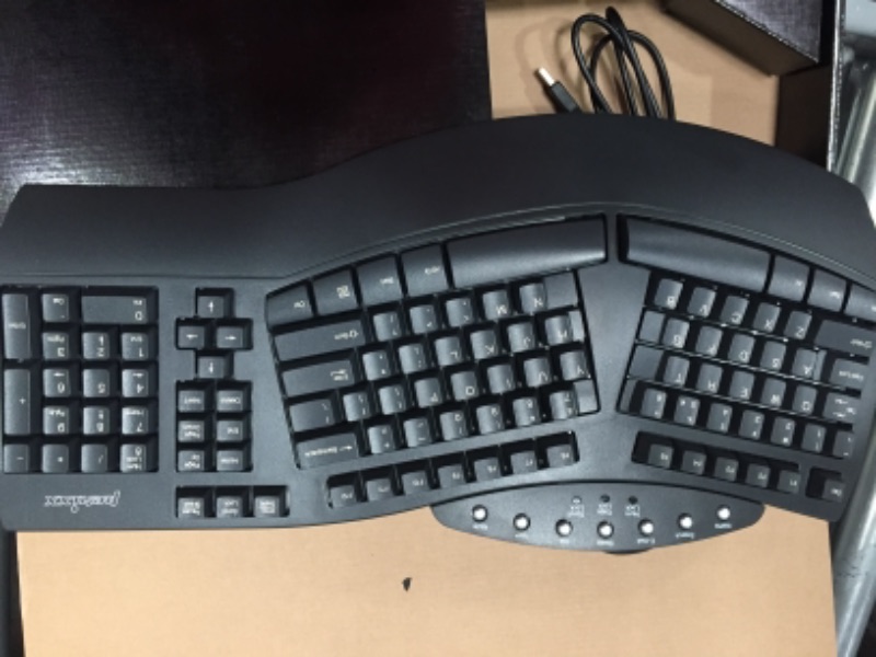 Photo 1 of Perixx Periboard-512 Ergonomic Split Keyboard - Natural Ergonomic Design - Black - Bulky Size 19.09"x9.29"x1.73", US English Layout Wired Black Keyboard