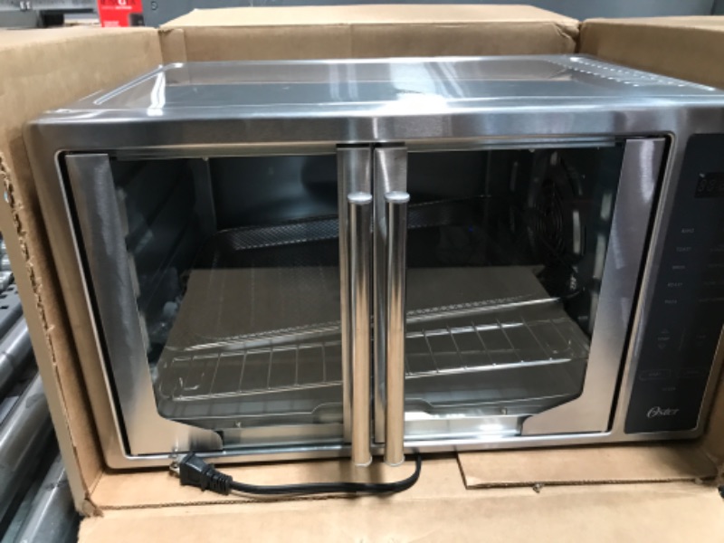 Photo 2 of Oster Air Fryer Oven, 10-in-1 Countertop Toaster Oven, XL Fits 2 16" Pizzas, Stainless Steel French Doors Countertop Toaster Oven + Air Fryer