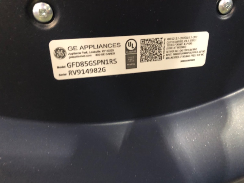 Photo 6 of ***USED - SCRATCHED - POWERS ON - UNABLE TO TEST FURTHER***
GE 7.8-cu ft Reversible Side Swing Door Stackable Steam Cycle Smart Gas Dryer (Sapphire Blue) ENERGY STAR
