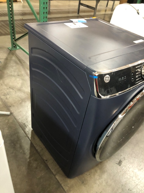 Photo 9 of ***USED - SCRATCHED - POWERS ON - UNABLE TO TEST FURTHER***
GE 7.8-cu ft Reversible Side Swing Door Stackable Steam Cycle Smart Gas Dryer (Sapphire Blue) ENERGY STAR
