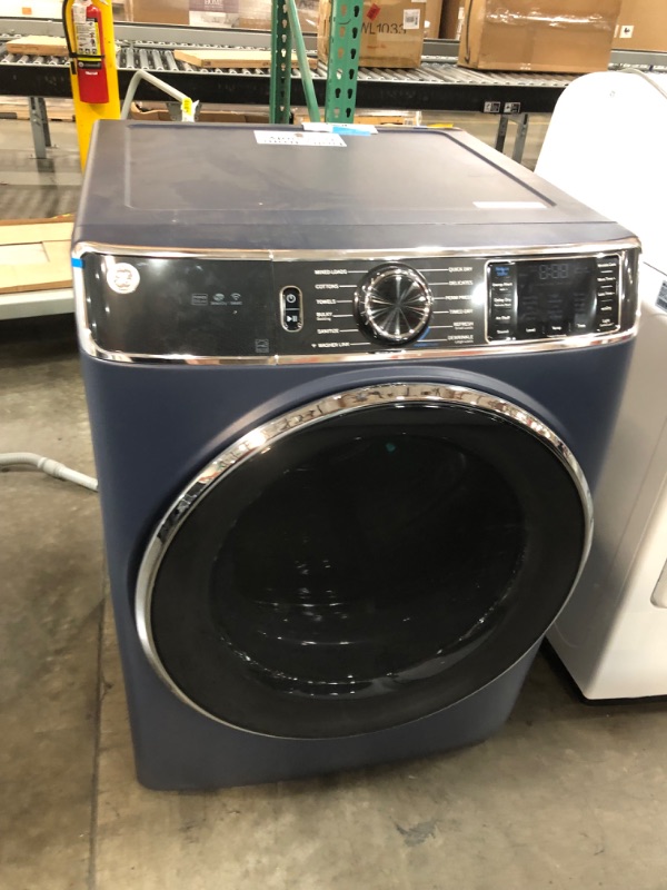 Photo 1 of ***USED - SCRATCHED - POWERS ON - UNABLE TO TEST FURTHER***
GE 7.8-cu ft Reversible Side Swing Door Stackable Steam Cycle Smart Gas Dryer (Sapphire Blue) ENERGY STAR

