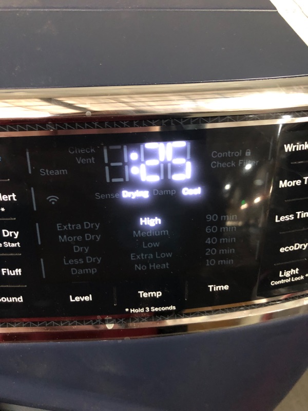 Photo 11 of ***USED - SCRATCHED - POWERS ON - UNABLE TO TEST FURTHER***
GE 7.8-cu ft Reversible Side Swing Door Stackable Steam Cycle Smart Gas Dryer (Sapphire Blue) ENERGY STAR
