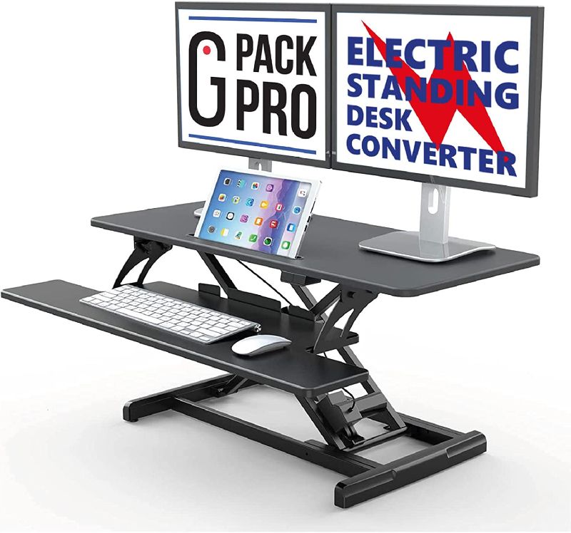 Photo 1 of G Pack Pro Standing Desk Converter - Electric Height Adjustable Desk for Sit Stand Desk Workstation with Removable Keyword Tray and Space for Dual Monitors - Ergonomic Design for Maximum Productivity
