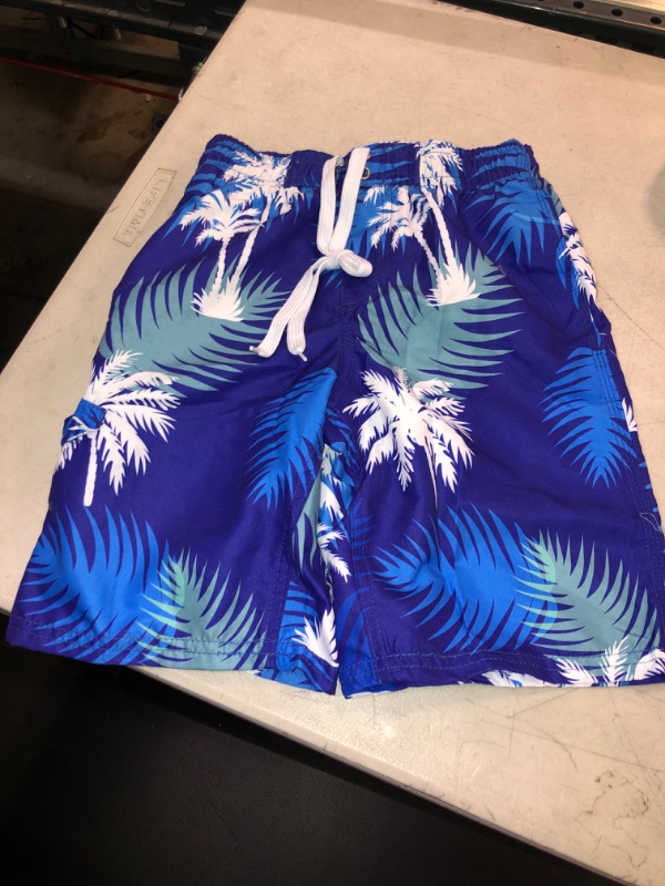 Photo 1 of BOYS SWIM TRUNKS . SIZ E S/M 