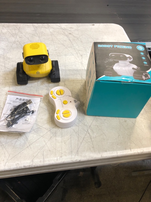 Photo 2 of AOVIKOOD Robot Toys for Boys Girls, Rechargeable Robots for Kids, 2.4GHz RC Remote Control Robots with Flexible Head & Arms,LED Eyes,Dance Moves and Music,Gifts for Children Age 3-5-8-12 ?Yellow?
