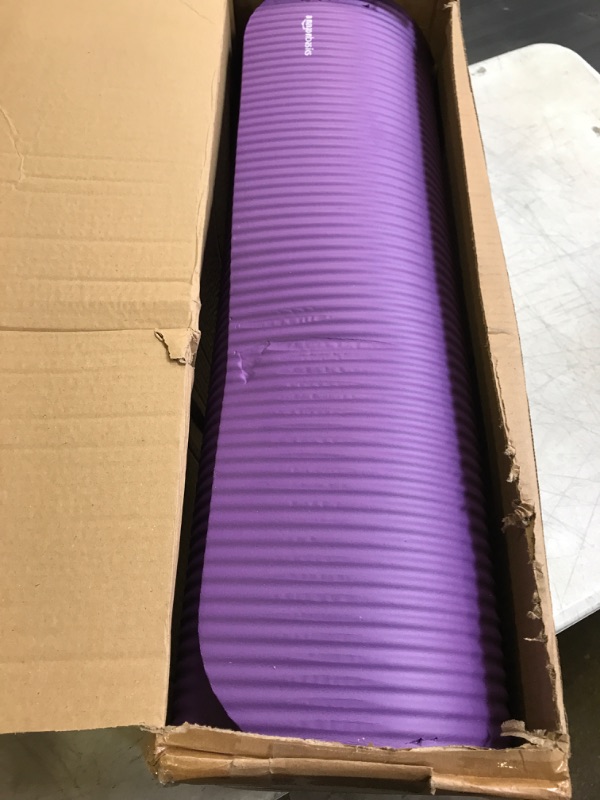Photo 3 of Amazon Basics Extra Thick Exercise Yoga Gym Floor Mat with Carrying Strap - 74 x 24 x .5 Inches, Purple & High-Density Round Foam Roller for Exercise and Recovery - 36 Inch, Black