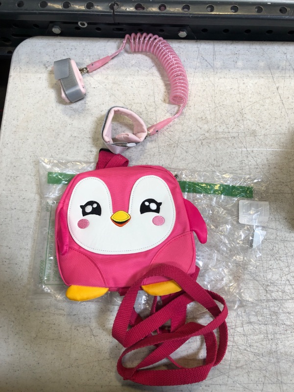 Photo 2 of Accmor Toddler Harness Backpack Leash, Cute Penguin Kid Backpacks with Anti Lost Wrist Link, Mini Child Backpack Harness Leashes Walking Wristband Rope Travel Bag Harness Rein for Baby Girls (Pink)

