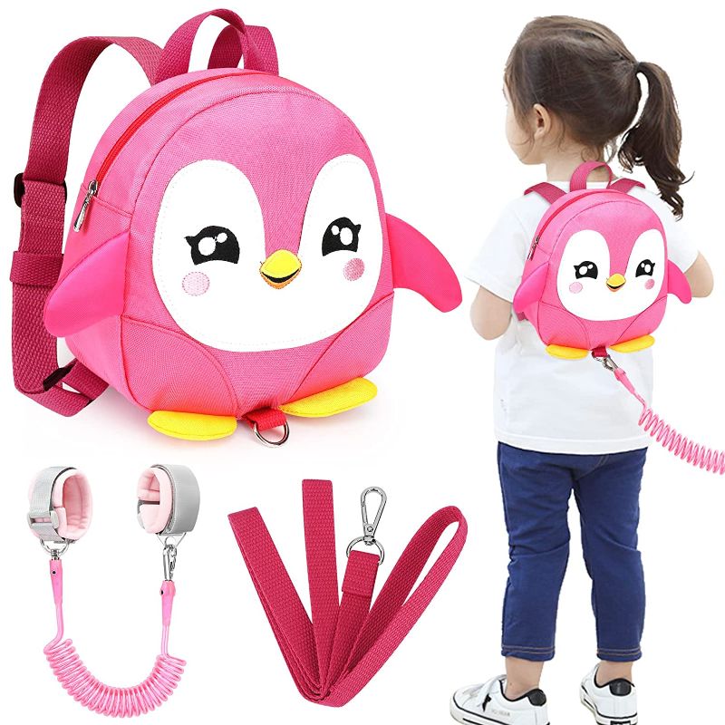 Photo 1 of Accmor Toddler Harness Backpack Leash, Cute Penguin Kid Backpacks with Anti Lost Wrist Link, Mini Child Backpack Harness Leashes Walking Wristband Rope Travel Bag Harness Rein for Baby Girls (Pink)
