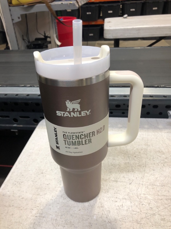 Photo 2 of Stanley Quencher H2.0 FlowState Stainless Steel Vacuum Insulated Tumbler with Lid and Straw for Water, Iced Tea or Coffee, Smoothie and More 40oz, Rose Quartz Glow 40oz ROSE QUARTZ GLOW