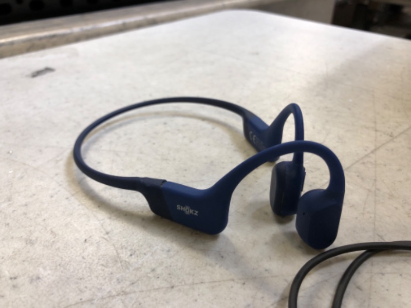 Photo 2 of SHOKZ OpenRun (AfterShokz Aeropex) - Open-Ear Bluetooth Bone Conduction Sport Headphones - Sweat Resistant Wireless Earphones for Workouts and Running - Built-in Mic, with Headband Standard Blue