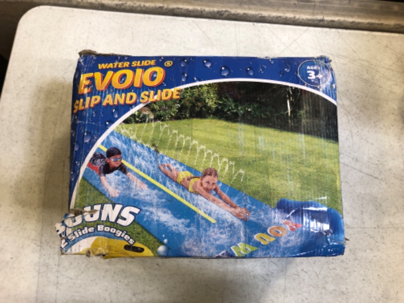 Photo 1 of Evoio Lawn Water Slide, 32.8FT Water Slide for Kids and Adults with 2 Racing Lanes and 2 BodyBoards, Inflatable Splash Water Slip for Kids Backyard, Outdoor Summer Water Toys for Backyard Garden
