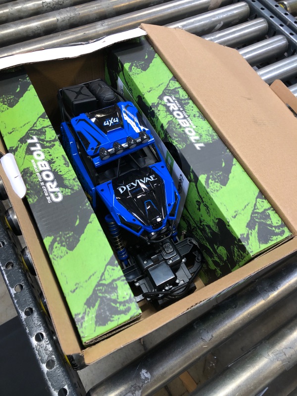 Photo 2 of CROBOLL 1:12 Large Remote Control Car for Boys Kids with Lifting Function,4WD RC Cars Electric Monster Truck Toy Gifts 4X4 Off-Road RC Rock Crawler 2.4GHz All Terrain RC Truck with 2 Batteries(Blue)