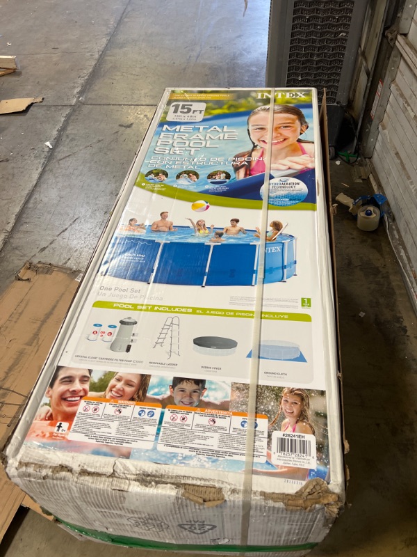 Photo 1 of INTEX 28241EH Metal Frame Above Ground Swimming Pool Set: 15ft x 48in – Includes 1000 GPH Cartridge Filter Pump & 28633EG C2500 Krystal Clear Cartridge Filter Pump 15ft x 48in Metal Frame Pool + Filter Pump 28633EG
