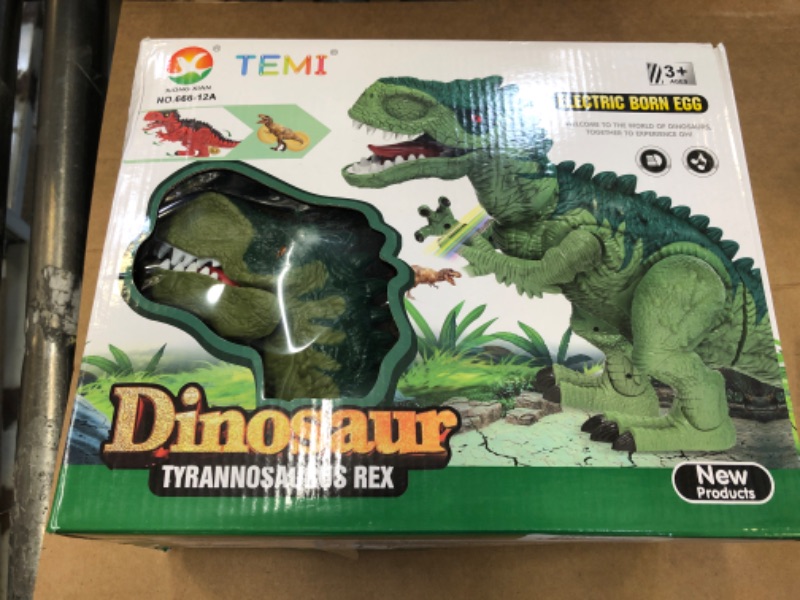 Photo 2 of TEMI Electric Walking Dinosaur Toy for Toddlers Kids 3 4 5 6 Years, Robot Dino with Sounds, Projection, Laying Egg, Jumbo Dinosaur Gift for Boys and Girls Cyan without Remote