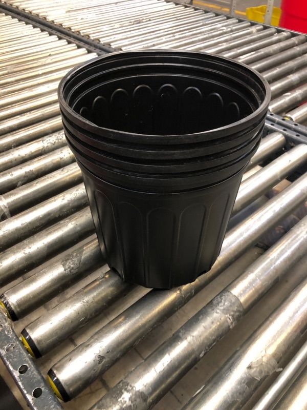 Photo 1 of 4 PACK OF MEDIUM SIZE PLASTIC PLANTERS FOR PLANTS 