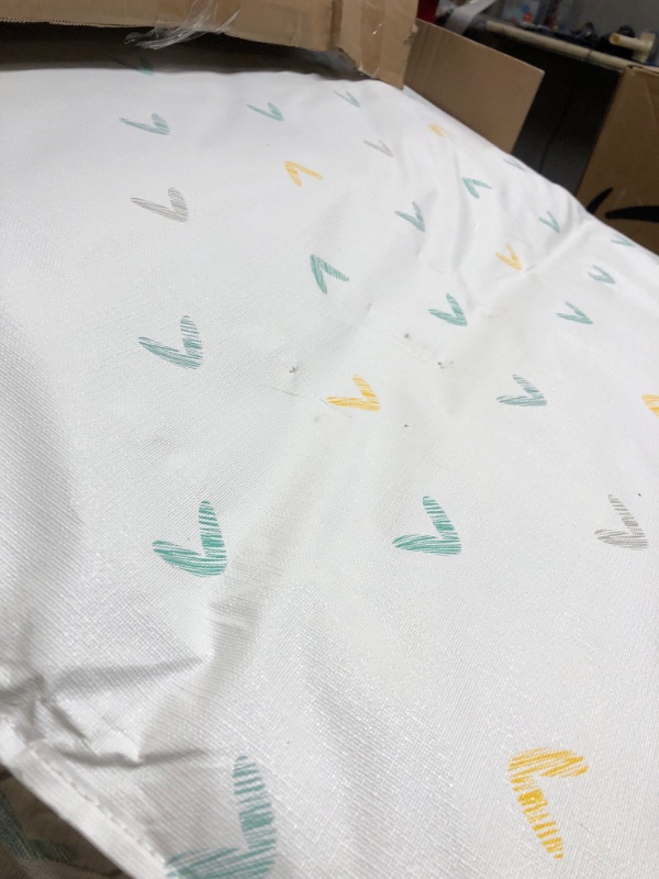 Photo 3 of BABY CRIB MATTRESS 52" X 27" X 6" WITH HEARTS / HAS A MINOR DENT IN THE MIDDLE FROM NEING FOLDED / POSSIBLY USED ************