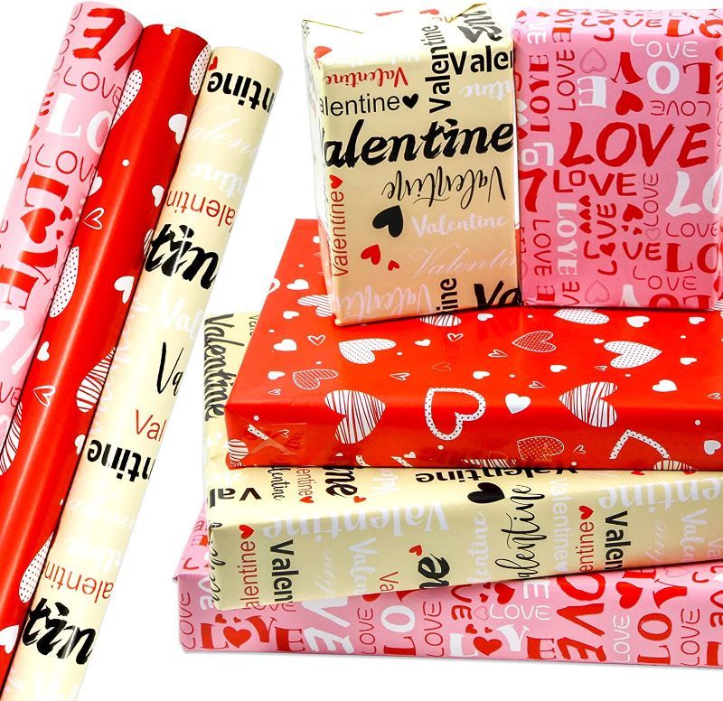 Photo 1 of WorldBazaar Valentines Wrapping Paper Roll with Cut Lines Valentine Heart Love Design Gift Wrapping Paper for Valentine’s Day Birthday Holiday 6 Pack Red Pink
