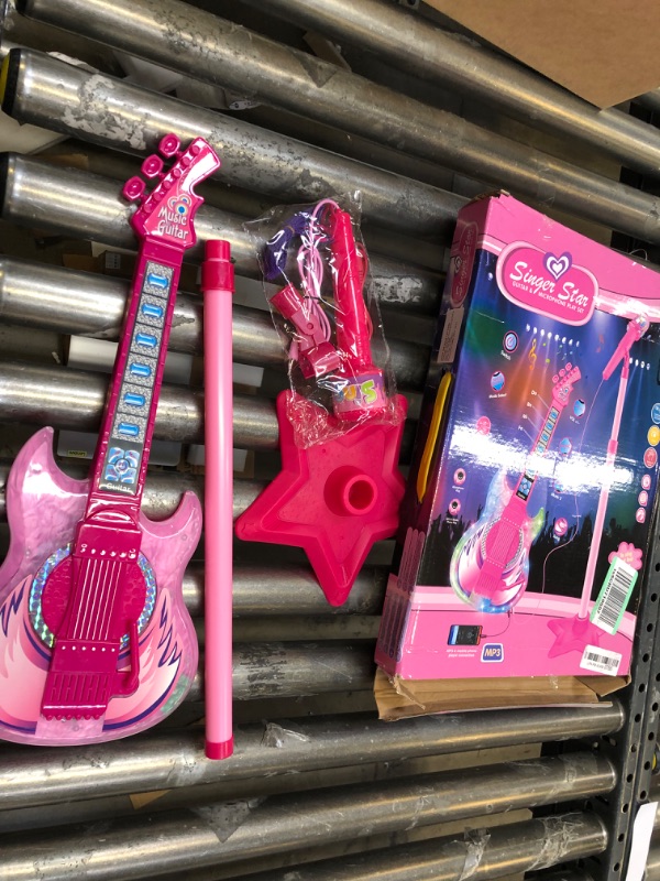 Photo 2 of TAKIHON Guitar and Microphone Set for Kids,Guitar Toys with Music&Colorful Light,Adjustable Height Microphone with Stand,Karaoke Toys Gift for Boy,Girls,Toddlers(Pink)