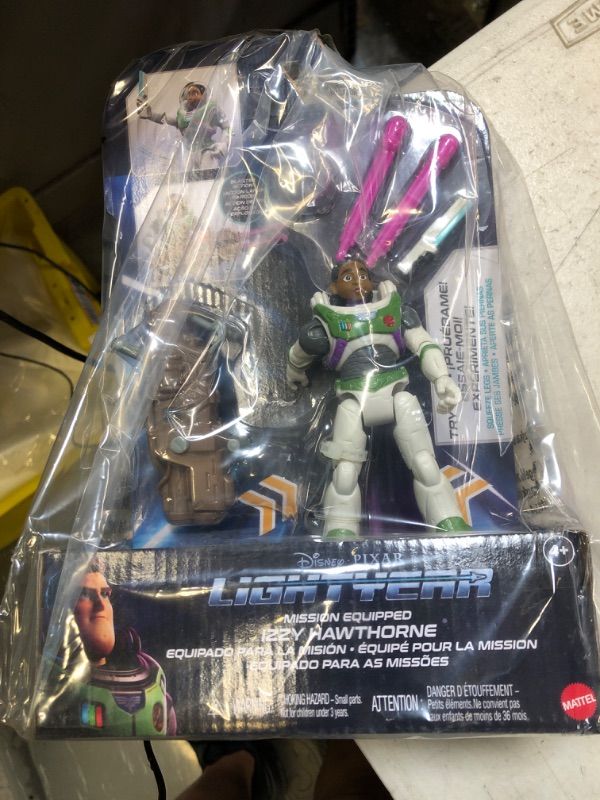 Photo 2 of Mattel Lightyear Toys Action Figure with Laser Strike Motion & Accessories, 5-in Scale Mission Equipped Izzy Hawthorne