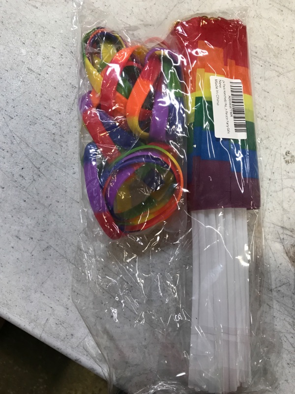 Photo 1 of 24 Pack Handheld Pride Flags and 24Pcs Pride Bracelets, LGBTQ Mini Rainbow Pride Flags, Rainbow Wristbands for Women Men Bisexual Pansexual Lesbian Transgender Gay Pride Month Parade Party Gifts