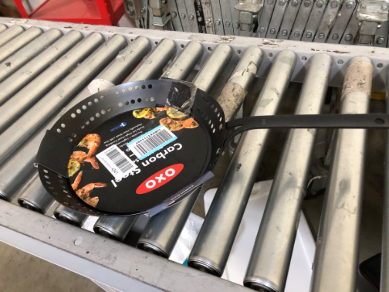 Photo 2 of OXO Obsidian Pre-Seasoned Carbon Steel, 12" Frying Pan Skillet with Holes for Grilling with Removable Silicone Handle Holder, Induction, Oven Safe, Black 12" Outdoor Skillet with Handle