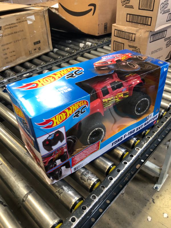 Photo 2 of ?Hot Wheels Remote Control Truck, Red Ford F-150 RC Vehicle With Full-Function Remote Control, Large Wheels & High-Performance Engine, 2.4 GHz With Range of 65 Feet HW FORD TRUCK RC