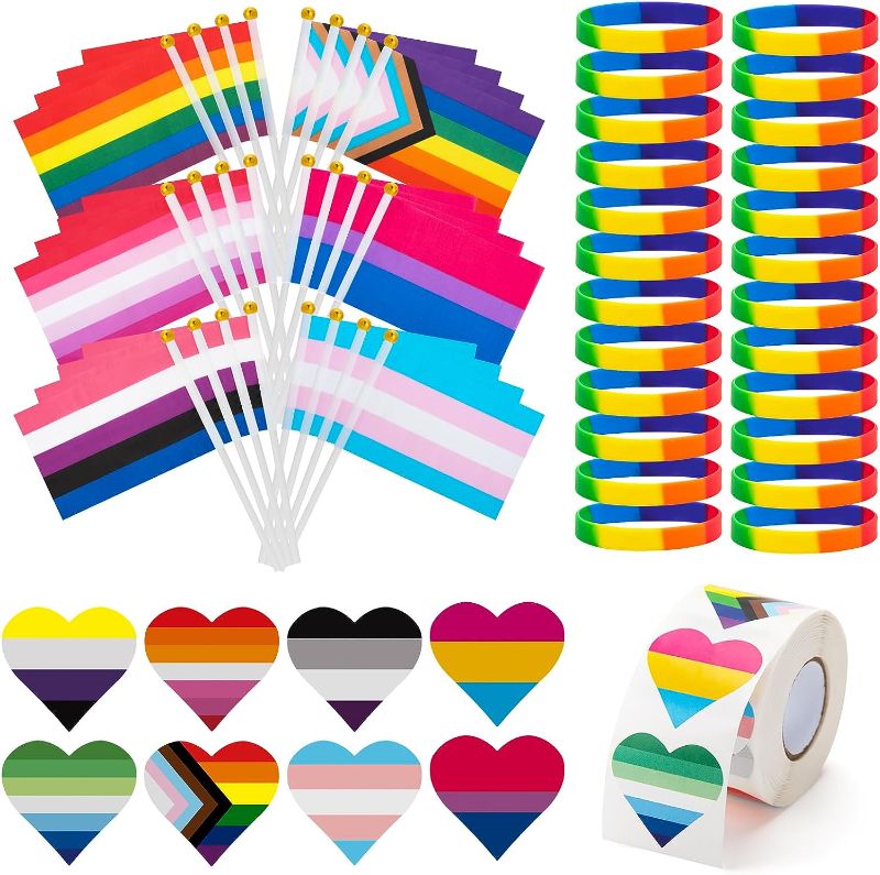 Photo 1 of 548Pcs Pride Accessories Stuff, LGBTQ Rainbow Small Progress Pride Flag Silicone Bracelet Wristbands Heart Sticker for Gay Lesbian Bisexual Trans Parades Festival Party Favors Supplies Decoration
